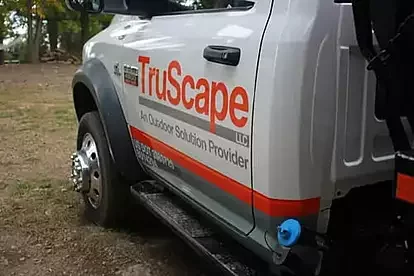 A TruScape Truck Cab showing bright colorful branding and shallow depth of field. 